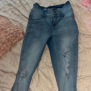 light blue ripped jeans